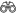 A stylized icon of binoculars.