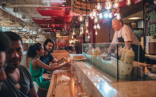 Couple dining at Jose Andres' China Chilcano in Penn Quarter DC - Bib Gourmand restaurants in Washington, DC